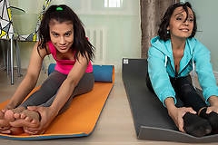 Lesbian yoga teacher seduces her young female student
